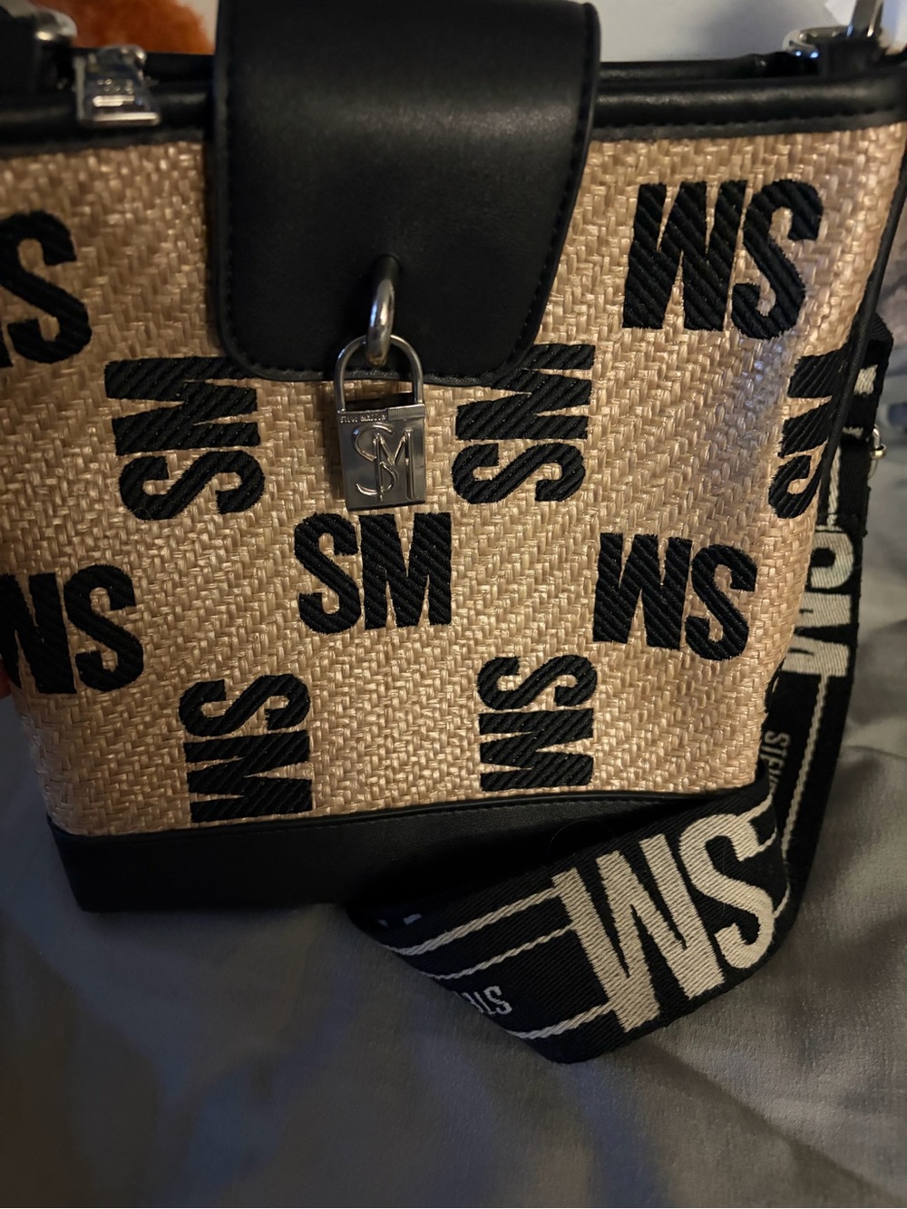 Steve Madden Monogram Straw Crossbody Bag with Black Trim